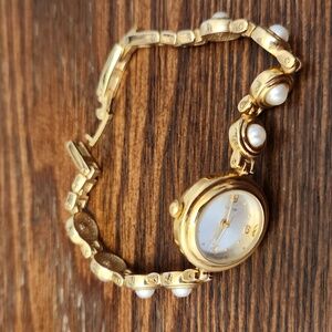 Pearl and gold watch